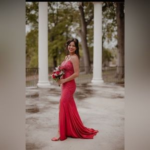 Stunnng red formal with iridescent sparkles. Size 0/2